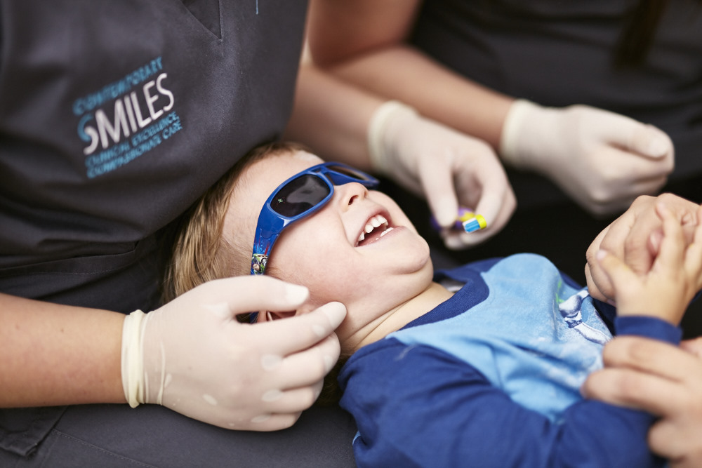 A young child enjoying the dentists at Contemporary Smiles Dental in Corrimal